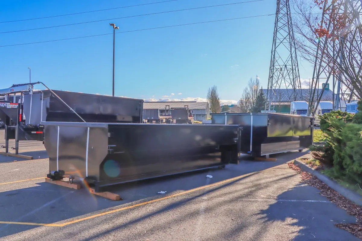 Roll-off dumpster ready for waste disposal at job site for 2 Yard Dumpster Rental in Mansfield